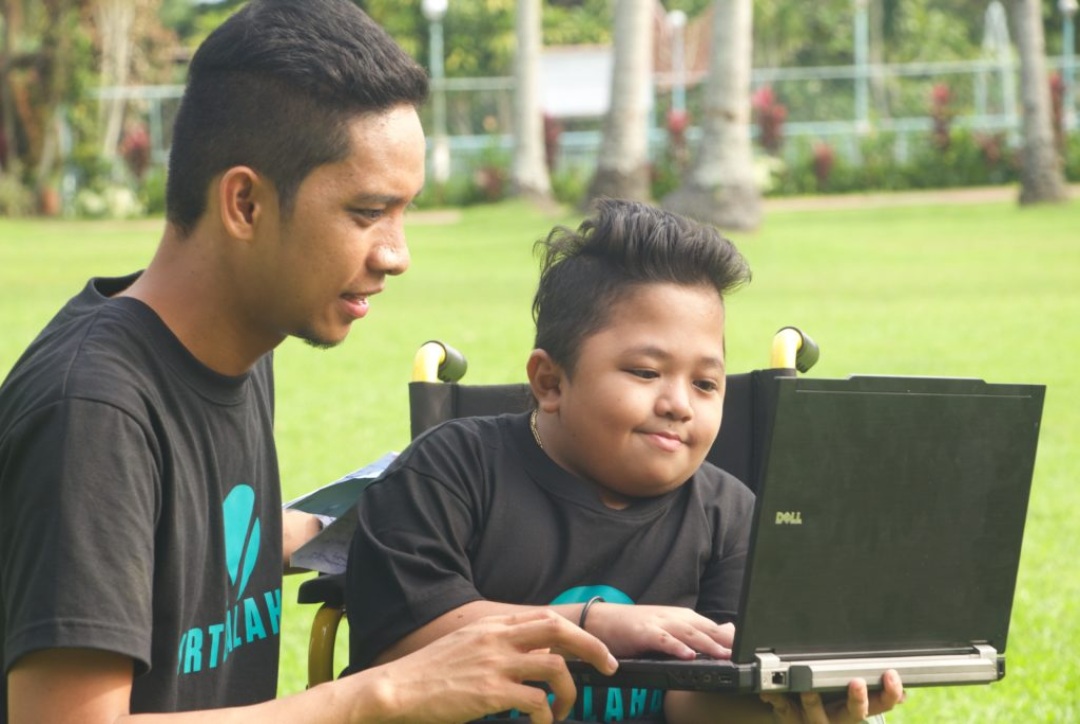 Virtualahan-founder-Ryan-Dawa-Gersava-with-one-of-the-groups-beneficiaries-1024x683-1 - MEGA