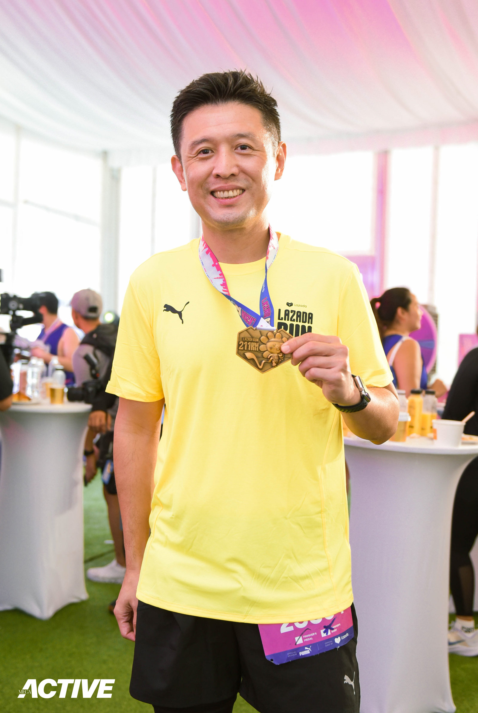 MEGA-Active-x-LazRun-In-Article-Image-6 - MEGA Lazada's Chief Marketing Officer, Marcus Chew, showed off his 21km medal with a smile in Lazada Run PH