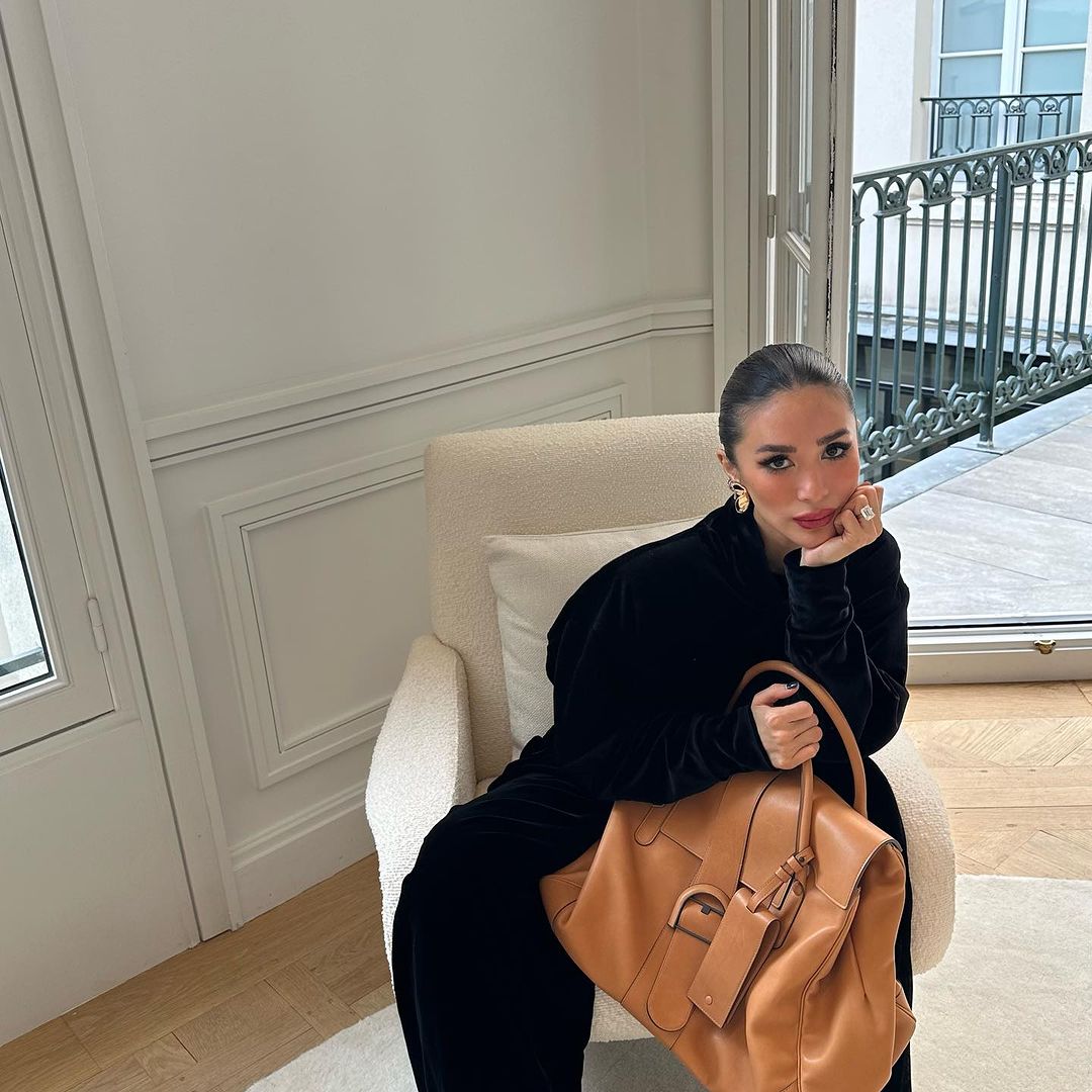 Heart Evangelista with slicked-back hair in Paris