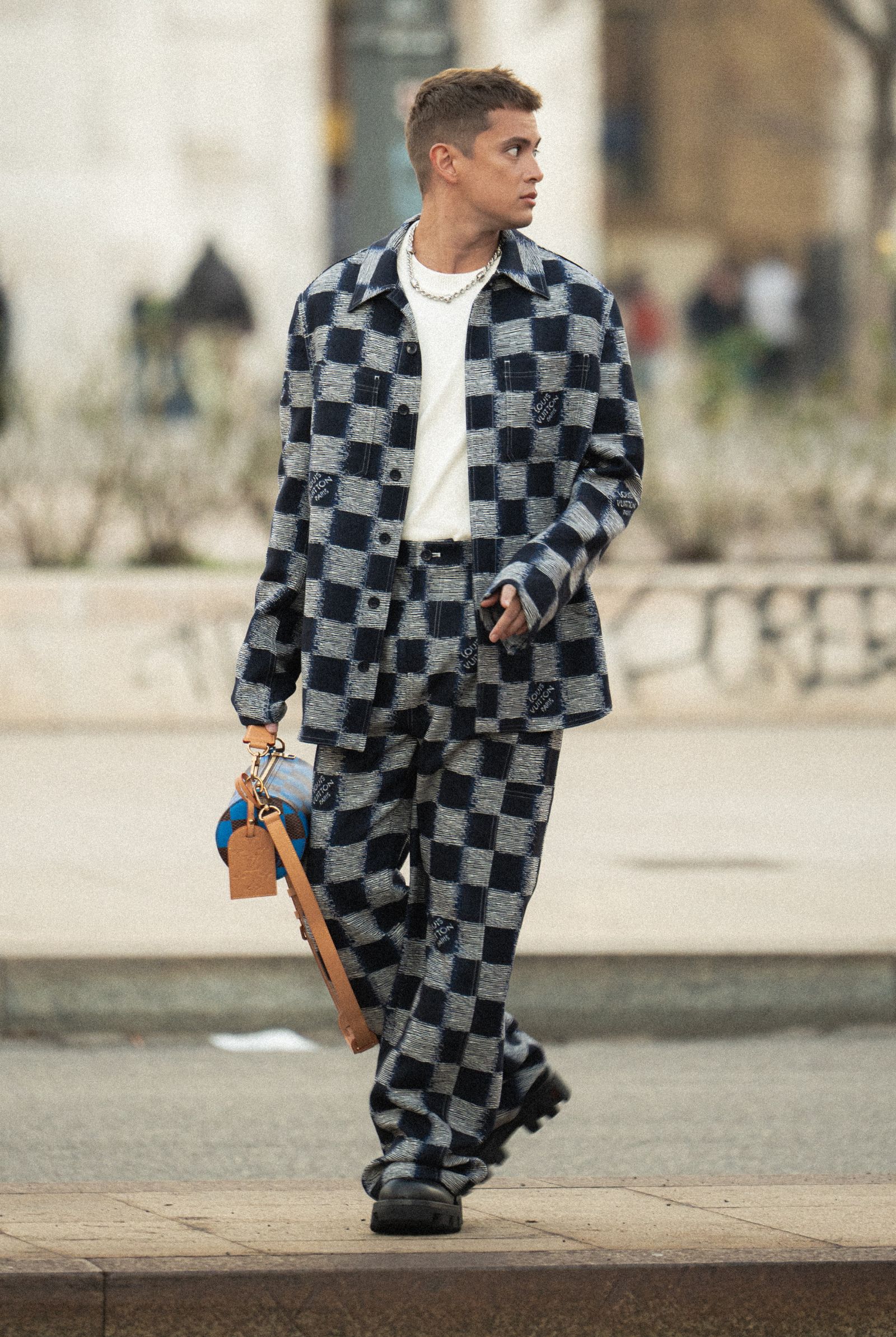 JAMES-REID-PFW-ART-3 - MEGA Embracing the charm of the House's Damier pattern, the actor heads to PFW.