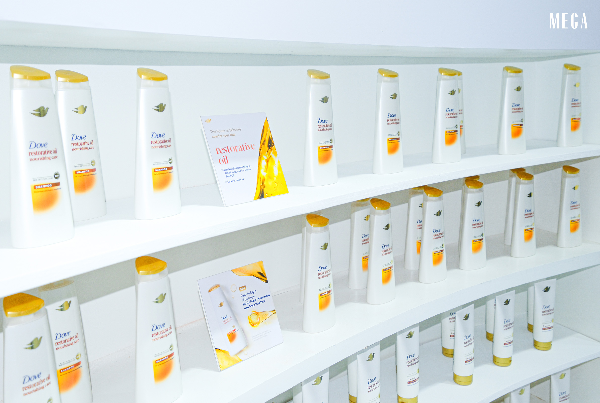 4-1 - MEGA Completing the new hair care line is Dove's Restorative Oil Nourishing Care Shampoo and Conditioner.