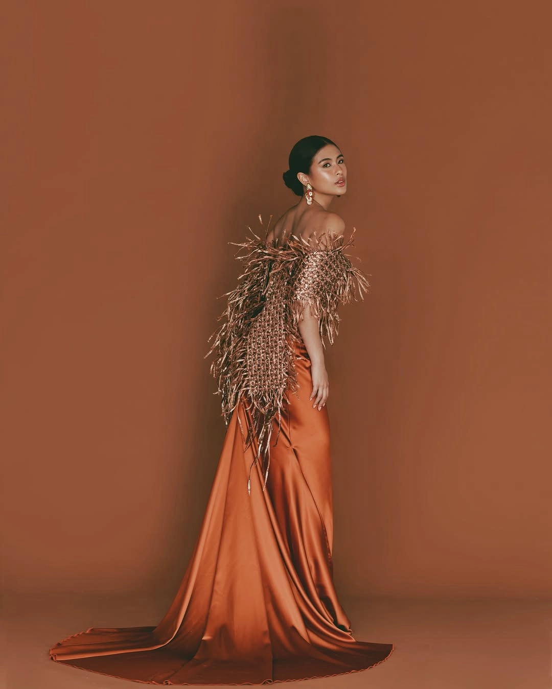 Babaylan by Martin bautista. Photographed by Charisma Lico-Santos. Creative direction by Pam Quinones. Makeup by Jason Delos Reyes. Hair by Aries Manal. Styling by Qurator Studio, Leanne Ledesma, Steven Coralde, and Claire Fernando. Jewelry by Arnel Papa. Set by AdSet. Produced by Sean Gabriel.